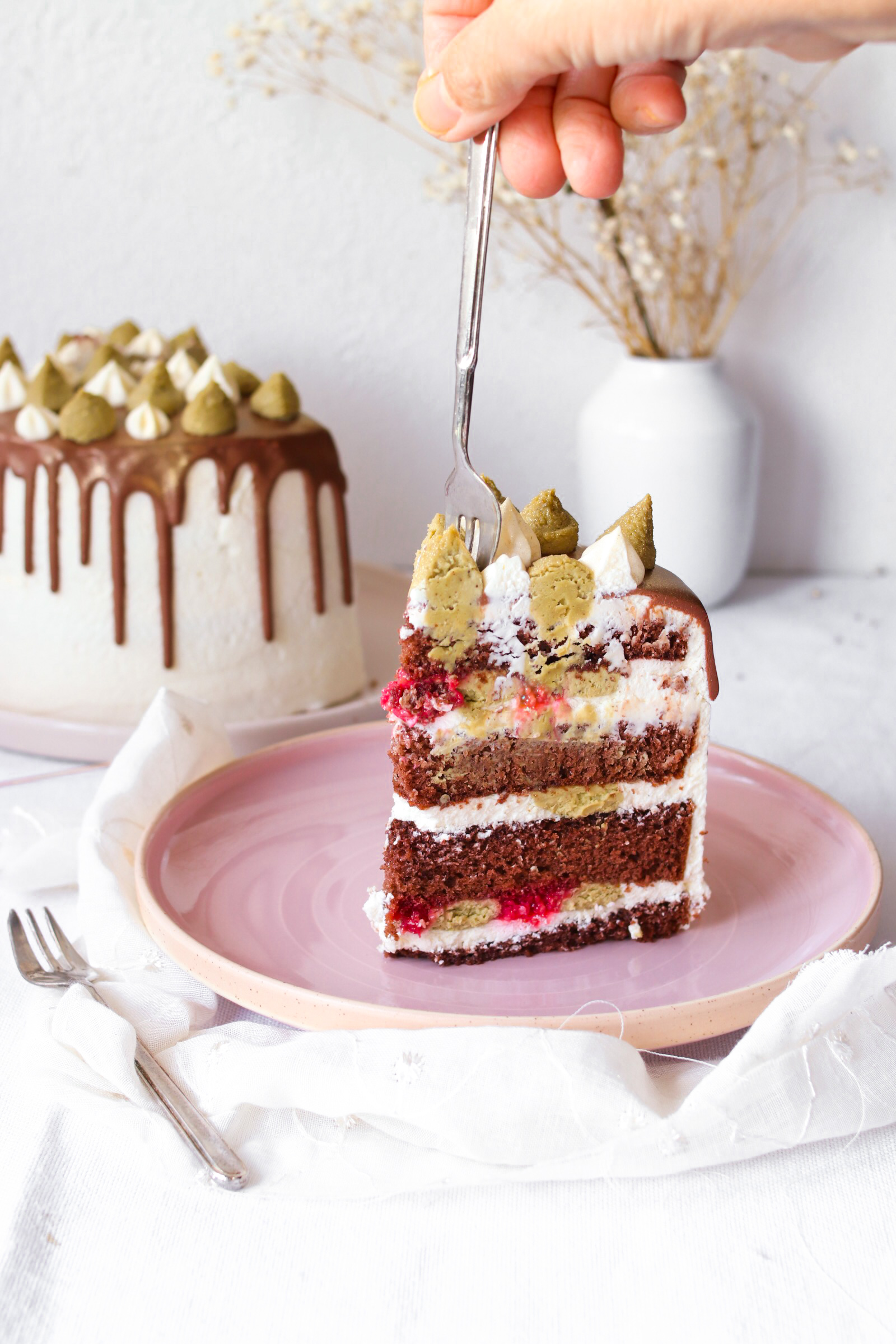 Drip Cake pistacchio e lamponi