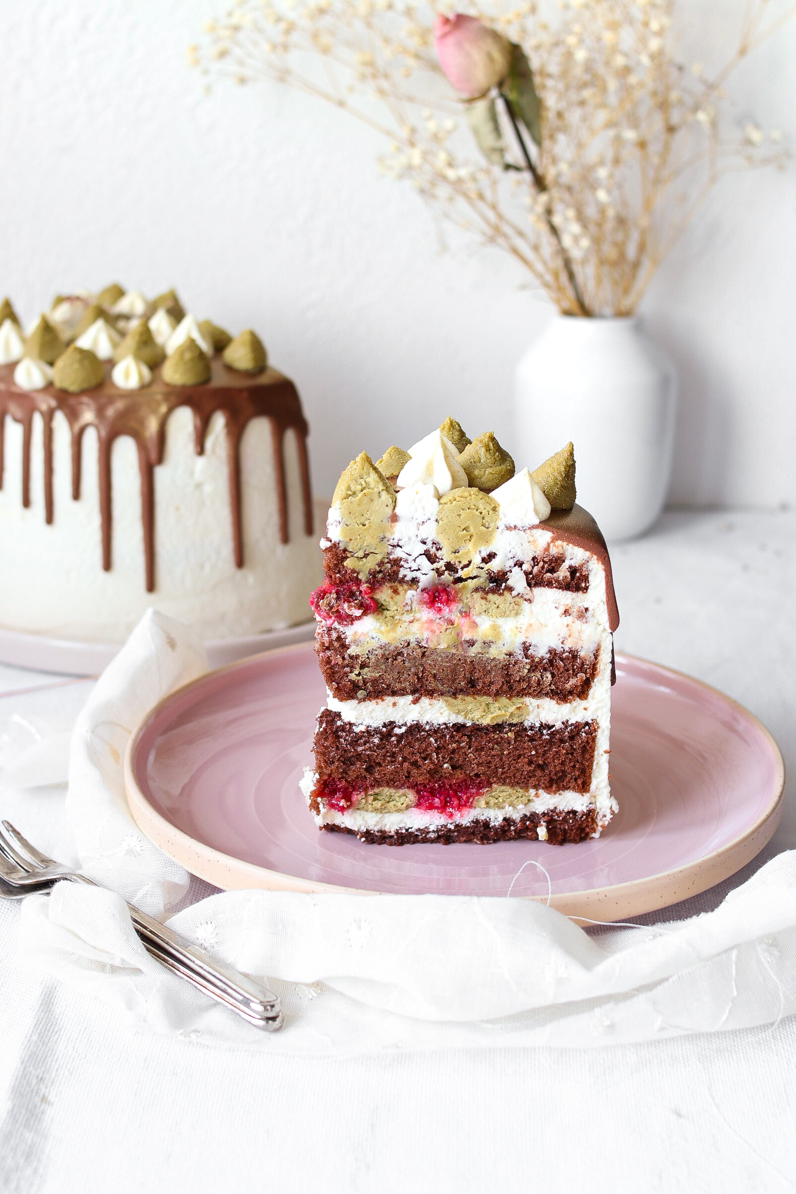 Drip Cake pistacchio e lamponi