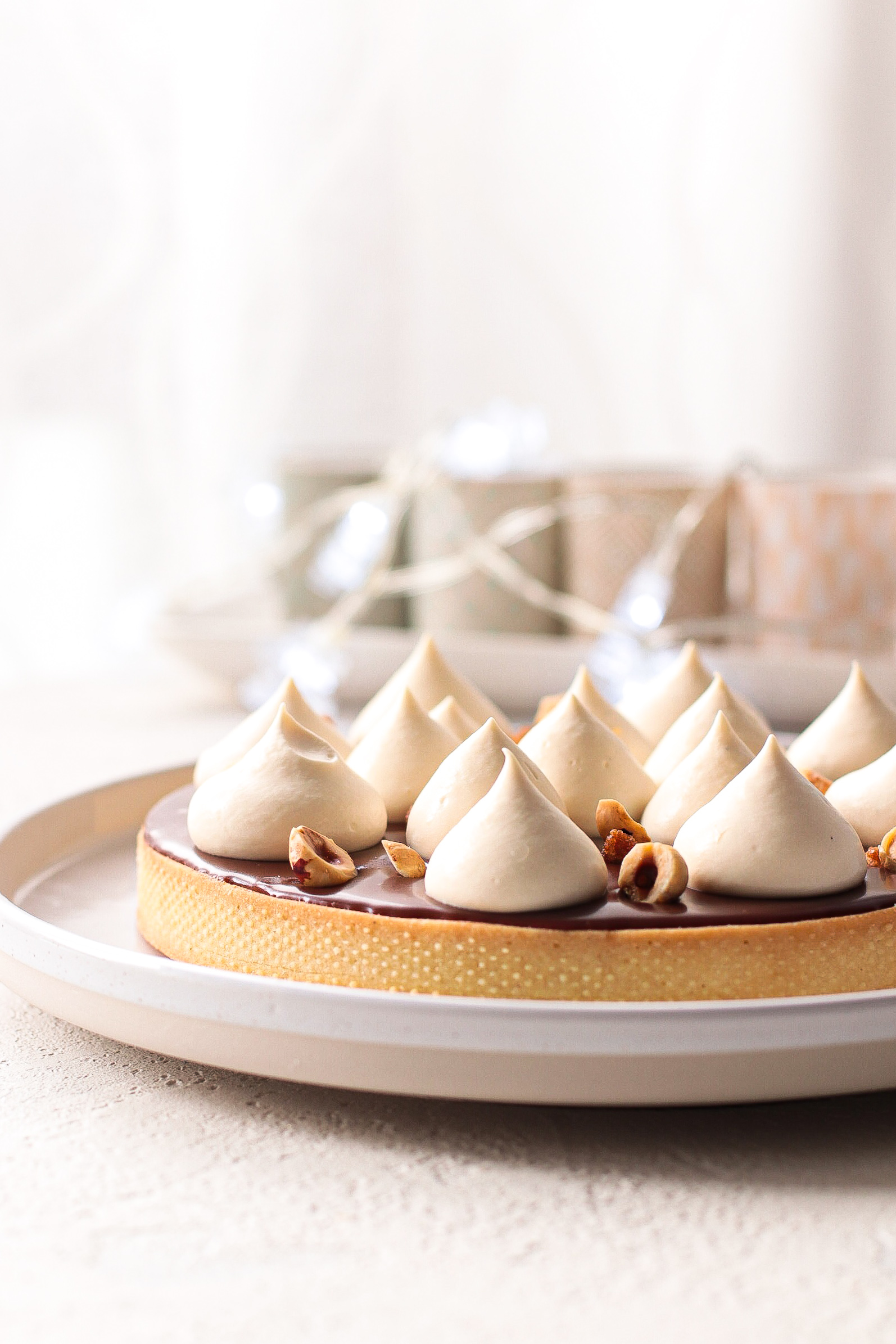 Crostata nocciole, caramello e cioccolato