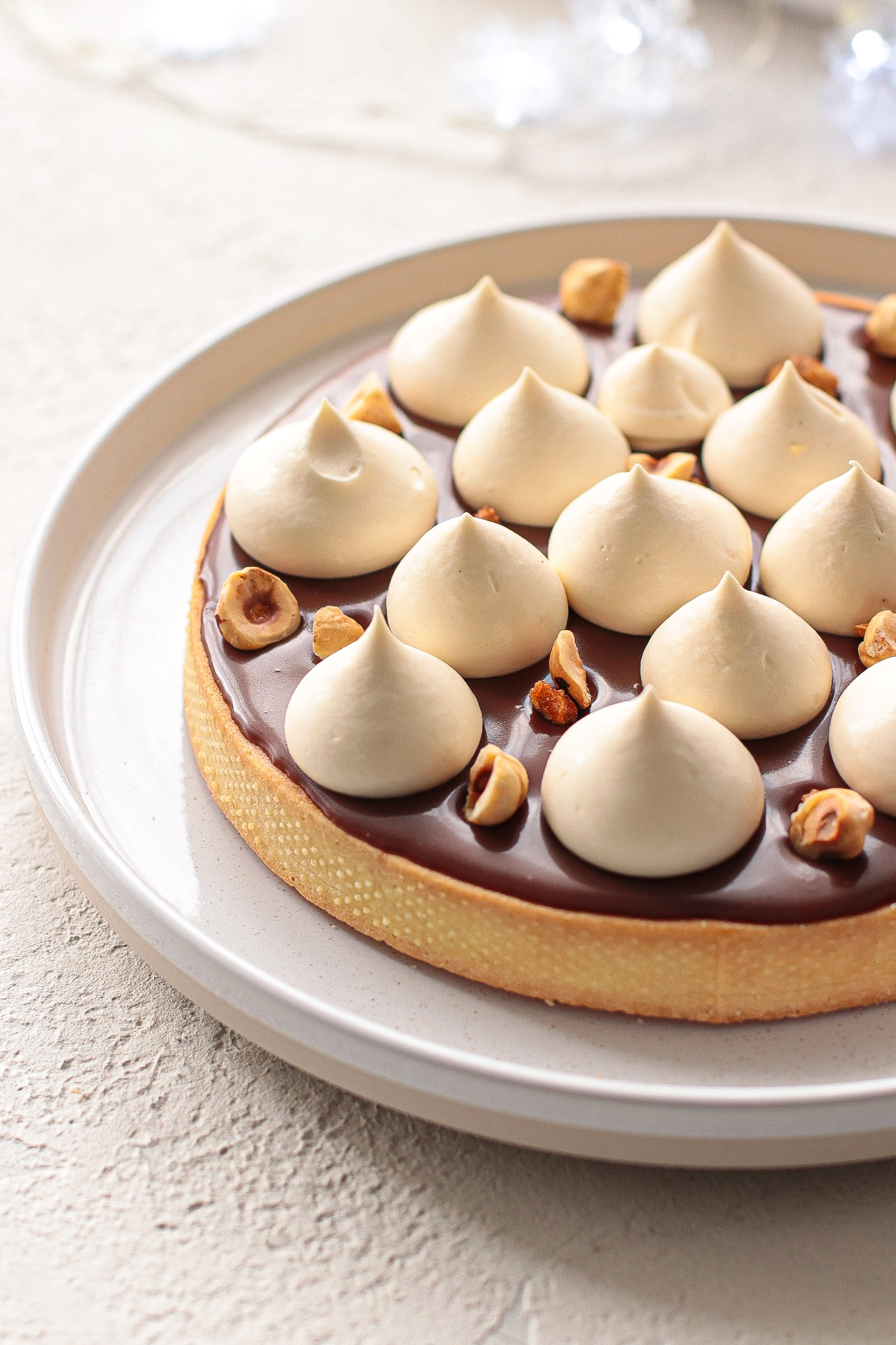 Crostata nocciole, caramello e cioccolato