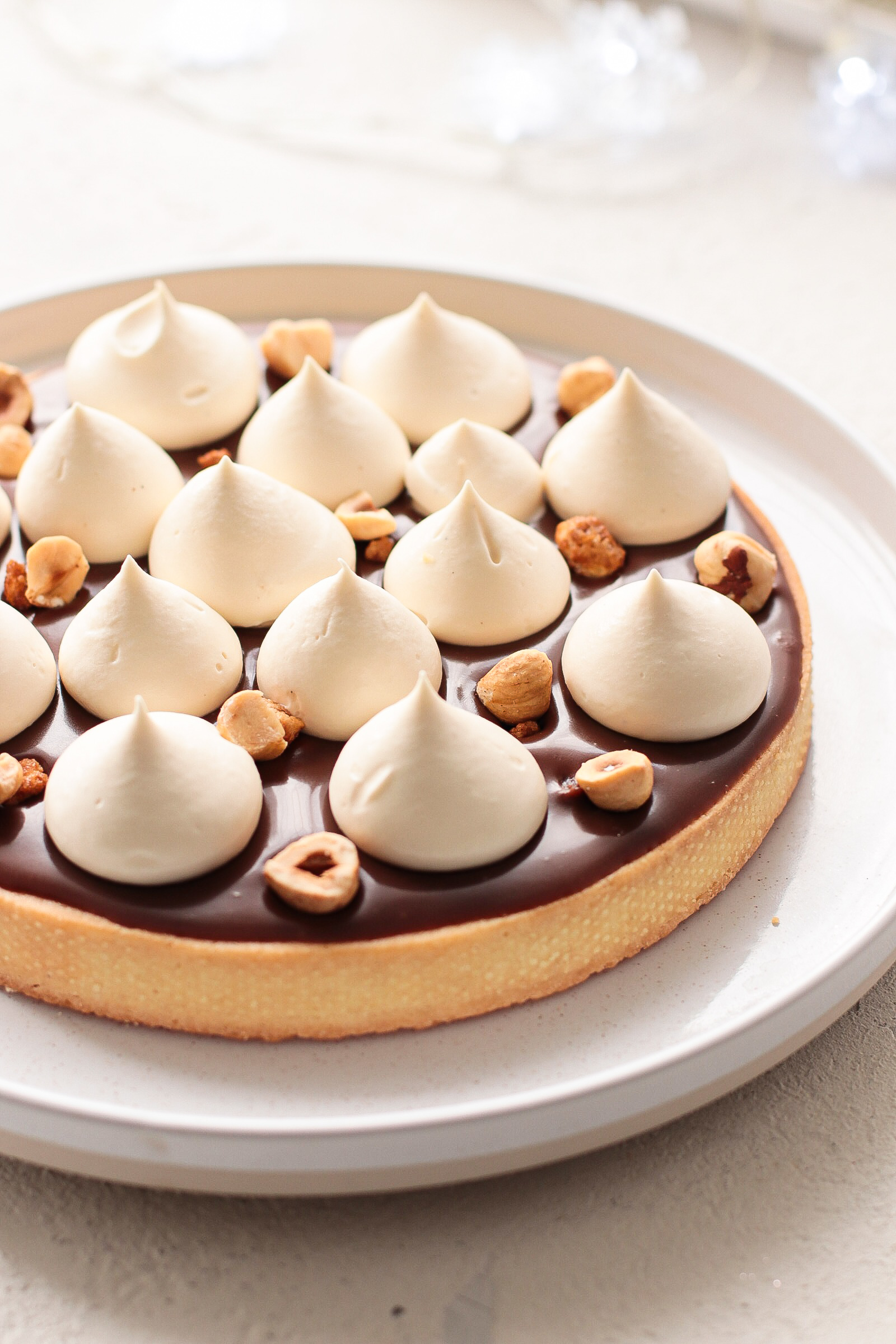 Crostata nocciole, caramello e cioccolato