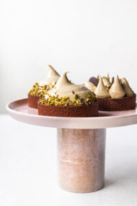 Tartellette pistacchio con cuore cremoso al praliné